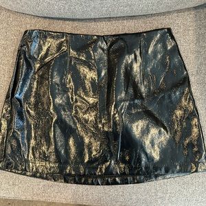 Vegan Leather Navy Skirt with Built in shorts underneath.